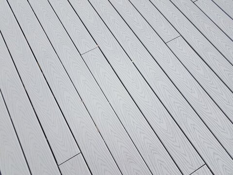 Grey Artificial Or Composite Wood Boards On Deck With Lines