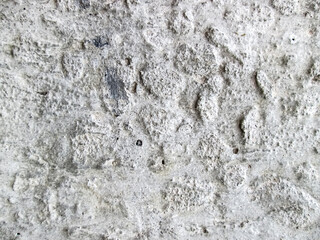Old stone surface with hardened concrete.
