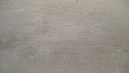 Plastering wall. Texture of a wall made of gray mortar.