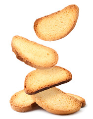 Bread rusks falling on a heap on a white background, levitating crackers. Isolated