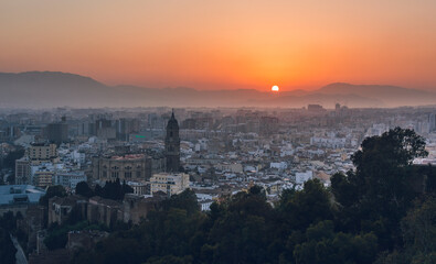 Fototapeta na wymiar Cityscape - Panorama of Malaga at Sunset, Andalusia, Spain