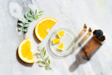 Obraz na płótnie Canvas Citrus fruit vitamin c serum oil beauty care