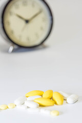 Pharmaceutical medicine pills in both tablets and capsules with the vintage retro picture style. Pharmacy theme and treatment medication as concept.	