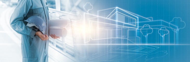 Panoramic banner of Engineer holding blueprint and helmet with construction drawing on background, planning for construction project