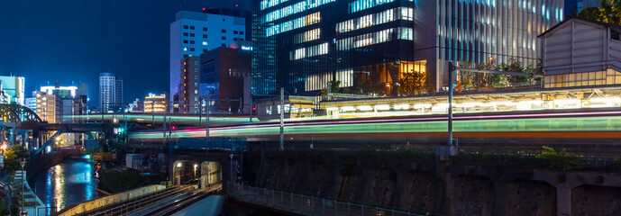Fototapeta premium Trains pass through Ochanomizu train station in Tokyo, Japan