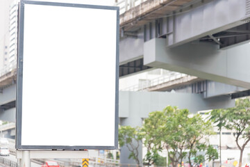 Blank billboard with white space for streets advertising. City view with the blank billboard to insert the pictures.