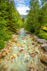 Vivid turquoise Soca river valley near Bovec in Triglav National Park, Julian Alps, Slovenia Europe.