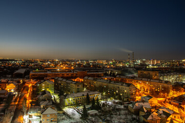Fototapeta na wymiar Beautiful sunrise in winter in the Ukrainian city of Ivano-Frankivsk