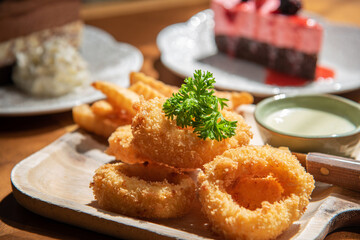 Calamari on wooden dish