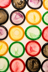 Colorful condoms background.