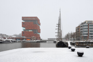 The famous MAS Museum (Museum aan de Stroom) covered in snow. The museum is a key landmark in Antwerp since 2011