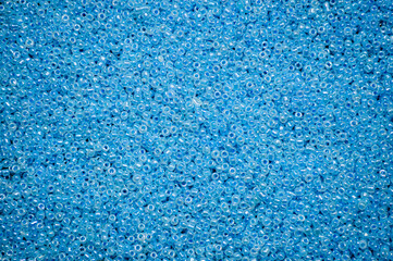 Fototapeta na wymiar Shiny blue beads close up