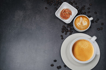cup of coffee and Fresh baked croissant on old kitchen table. Top view with copyspace for your text.