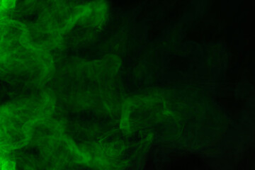 Green steam on a black background.