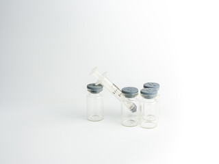 Syringe and vaccine bottle On a white background