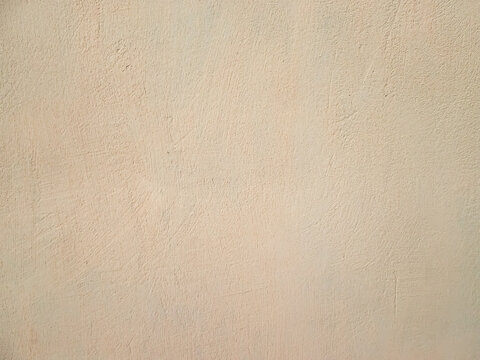 Beige grainy paint. Light texture with a grainy surface.
