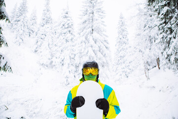 man snowboarder in ski equipment