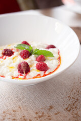 Rice porridge with raspberries