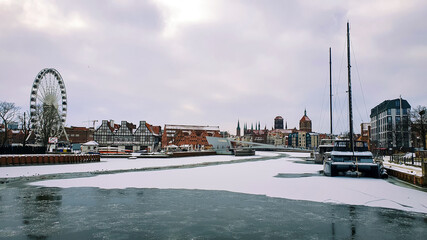 View of Gdansk old Town from the Motlawa River, Poland. Ancient European city. Winter scenery.