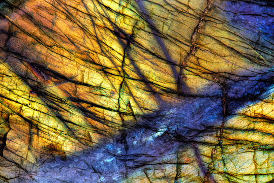 Amazing colorful texture of Labradorite mineral gemstone background macro close-up