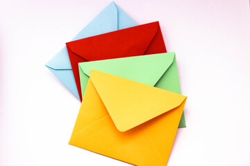 colorful envelopes on isolated white background. Top view. 