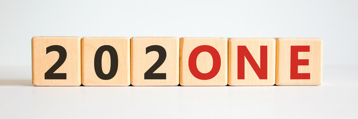 Business concept of planning 2021. Wooden cubes with the words '202one', symbol of changes 2020 to 2021 new year. Beautiful white background, copy space. Business, 2021 new year concept.