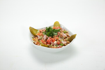 Green salad, tomatoes, cucumbers, carrot, lettuce, lemon, spice