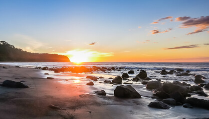 Fototapeta na wymiar Beautiful red sunset in Nicaragua beach. Central America