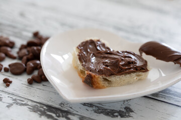 bread with chocolate in heart shape. heart shaped cake. chocolate food