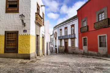 street with old, picturesque and charming houses in bright colors in the city of Las Palmas de Gran Canaria. Canary Islands. Spain.