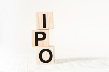 a word IPO on wooden cubes. business concept. business and Finance