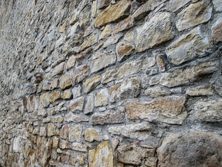 Historical background with a bricked wall. Fortress with sandstone.