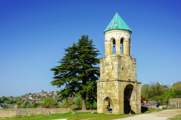 Fototapeta na wymiar Kutaissi, small Tower in the garden of Bagrati church