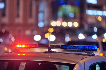 Police car lights at night city street