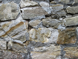 Solid sandstone laying. The frozen wall of the fortified moor.