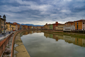 Fototapeta na wymiar View of the River Arno in the city center of Pisa Tuscany Italy