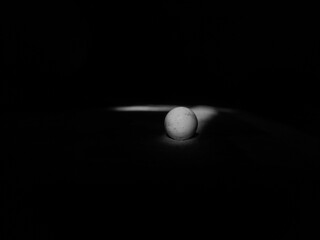 Small boll in dark background