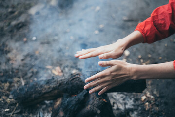 young woman traveler walking in t he tropical forest, nature scene outdoor in the concept of freedom and relax with natural environment field, spa and relaxing with tree plant and green park