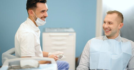 Small talk between patient and dentist, preparing for the dental check up at the dental office. Regular visit to the orthodontist. 4k video screenshot, please use in small size