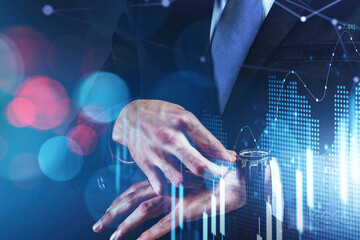Time is money. Trader, businessman checking time while looking at his watch and standing over hologram financial charts. Stock market prediction and wealth management. Double exposure