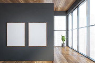 Modern office entrance area with grey wall wooden parquet. Panoramic city view windows. Two canvas poster on wall. Mock up.