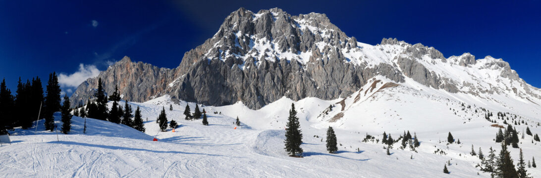 Ski Area Ehrwalder Alm With View To Mount Zugpitze Austria On A Beautiful Sunny Winter Day With  a Clear Blue Sky