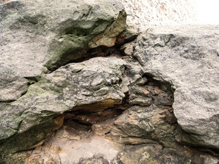 Beautiful masonry of stones of different sizes. Stock background with a neutral natural background.