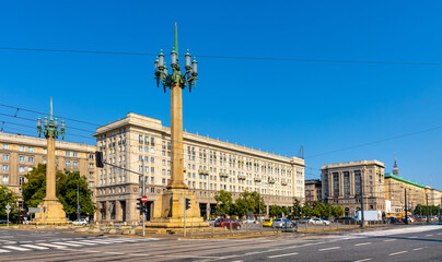 Panoramic view of  Plac Konstytucji Constitution square with communist architecture of MDM quarter in Srodmiescie downtown district of Warsaw, Poland - obrazy, fototapety, plakaty