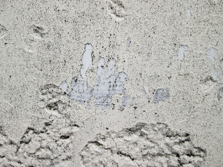 White battered wall with dots and bumps. Old retro effect.