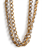 Jewelry chain, made of gold and silver links on white