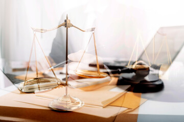 Business and lawyers discussing contract papers with brass scale on desk in office. Law, legal...