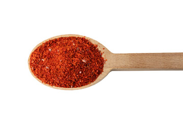 chilli pepper seedless flakes  in wooden spoon isolated on white background. Spices and food ingredients. in Korea known as Gochugaru. Used for Kimchi.
