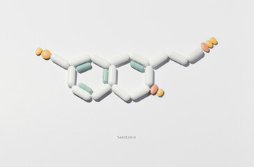 serotonin, photograph of pills recreating the chemical formula of serotonin