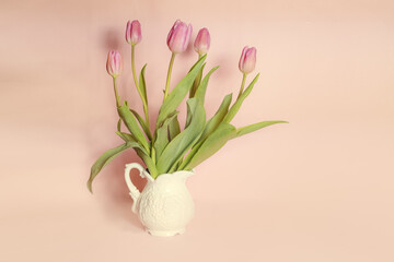 bouquet of tulips on pastel background
